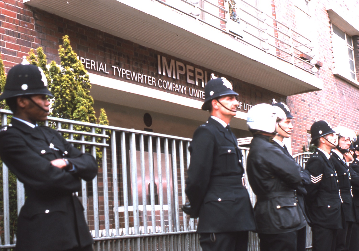 police_in_front_of_imperial_typewriter_in_leicester_england_august_1974